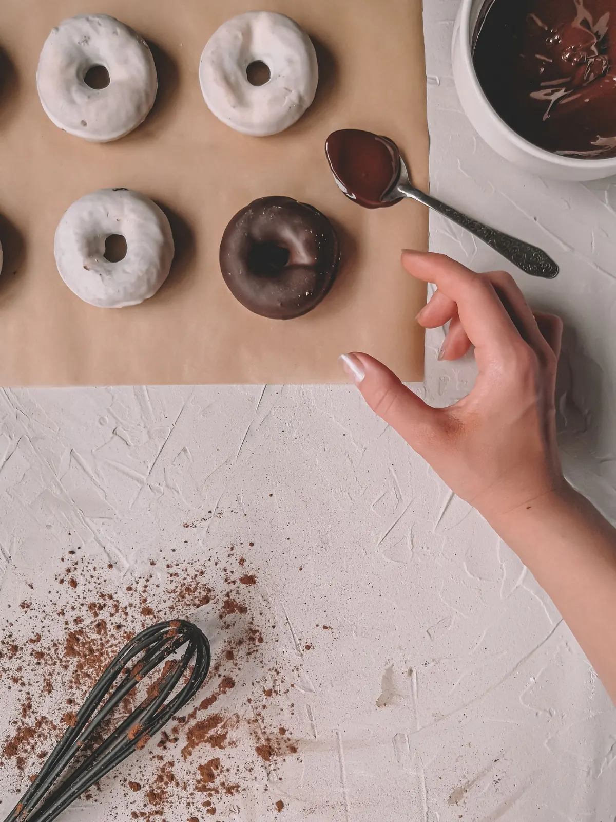 Baked donuts with vanilla and chocolate glaze